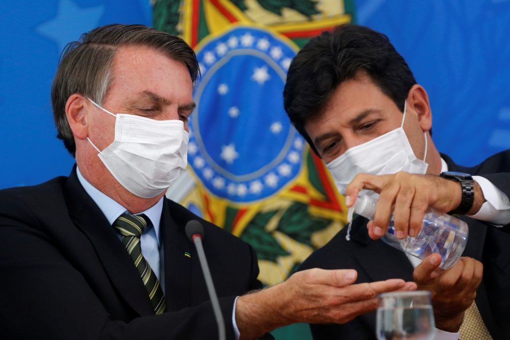 O Presidente do Brasil, Jair Bolsonaro, e o Ministro da Saúde, Luiz Henrique Mandetta - Foto: Adriano Machado/Reuters